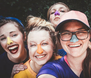 NOZ Sunscreen Sticks In Action As The Blue, Yellow, Orange and Purple Bring A Pop Into One’s Day