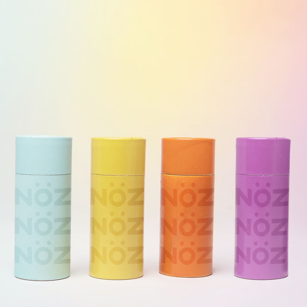 Neon NOZ Sunscreen Sticks in Blue, Yellow, Orange and Purple